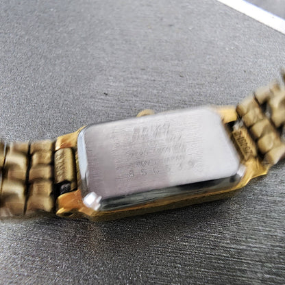 Seiko Tank Watch Women 13mm Silver Tone Gold Tone Rectangle 2e206859 NewBattery9