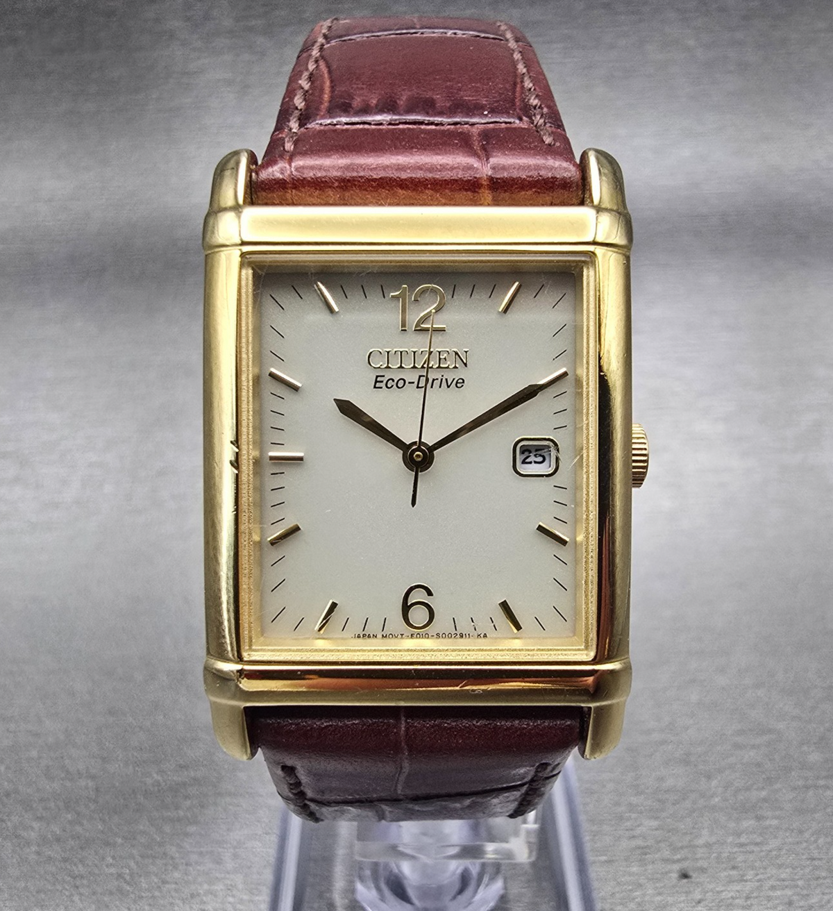 Citizen Eco-Drive Tank Watch Men 25mm Ivory Dial Gold Date E010-S001579 Works0