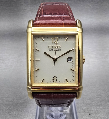Citizen Eco-Drive Tank Watch Men 25mm Ivory Dial Gold Date E010-S001579 Works0