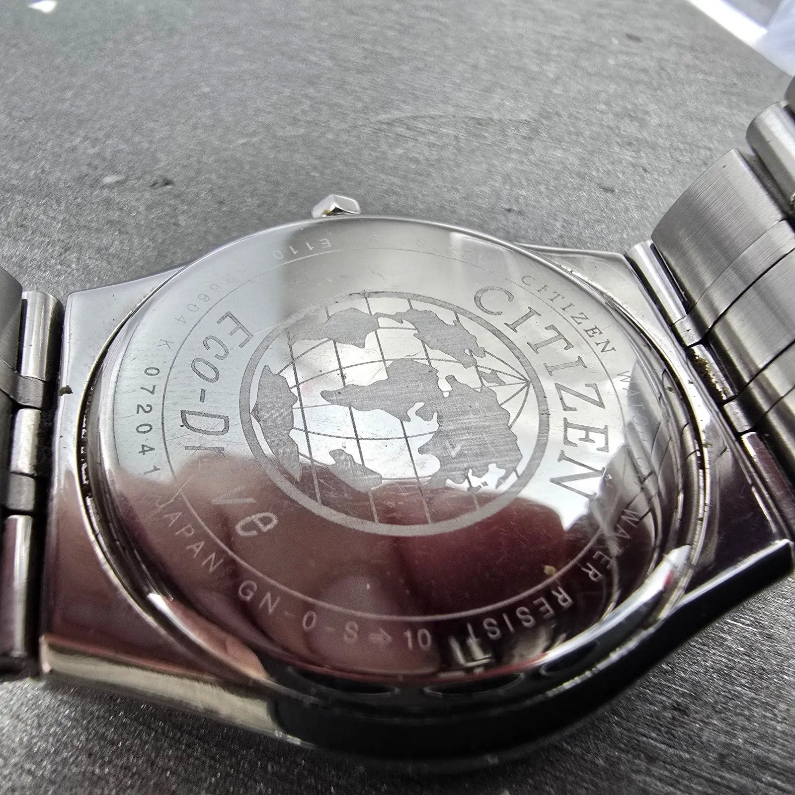 Citizen Eco-Drive Watch Men 36mm Black Dial Silver Date Round E110-H26604 Runs10