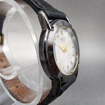 VTG Seiko Watch Women 22mm Silver Dial Black Tone Round 1N01-0A29 New Battery