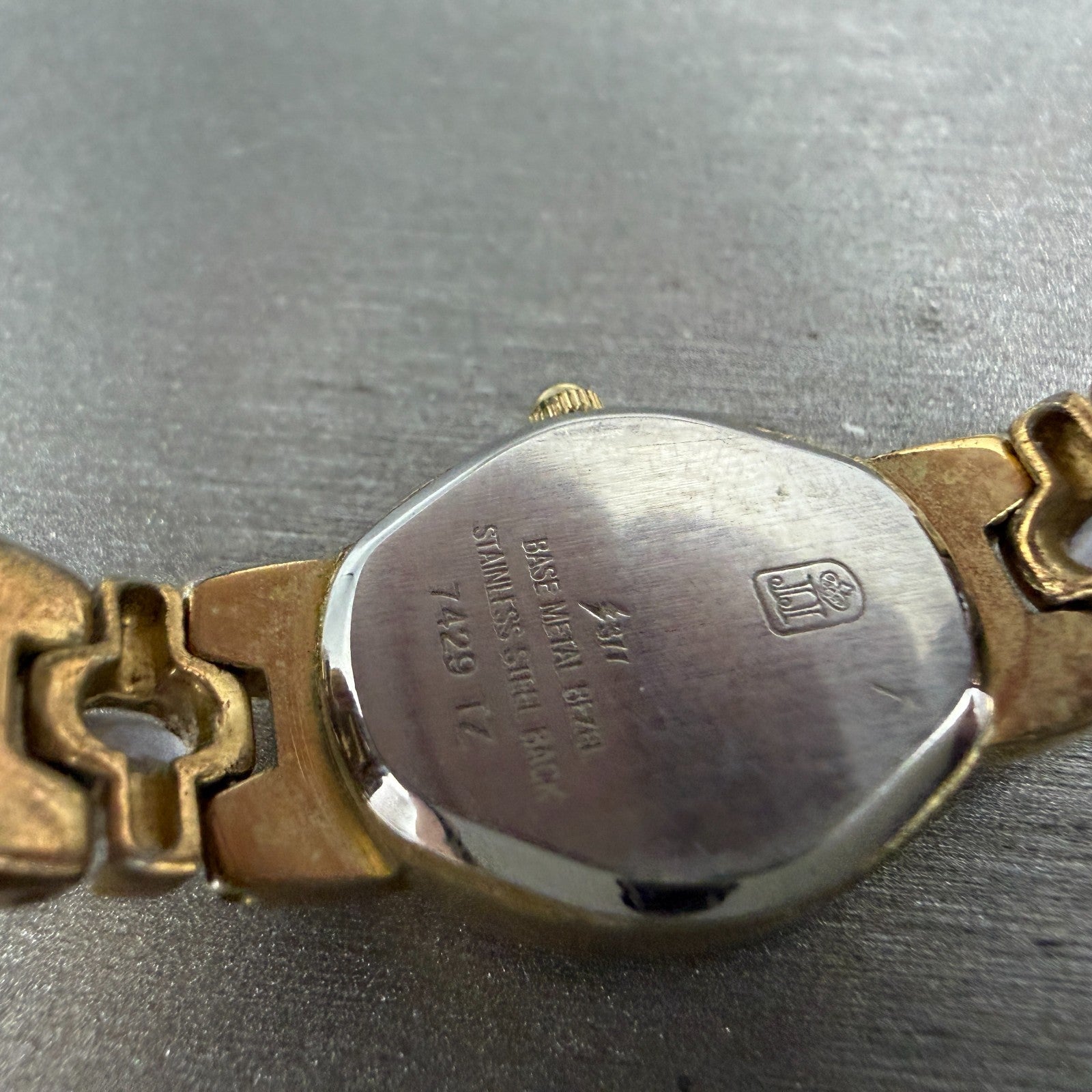 Jules Jurgenson Watch Women 17mm Champagne Dial Gold Oval Blue Gems New Battery9
