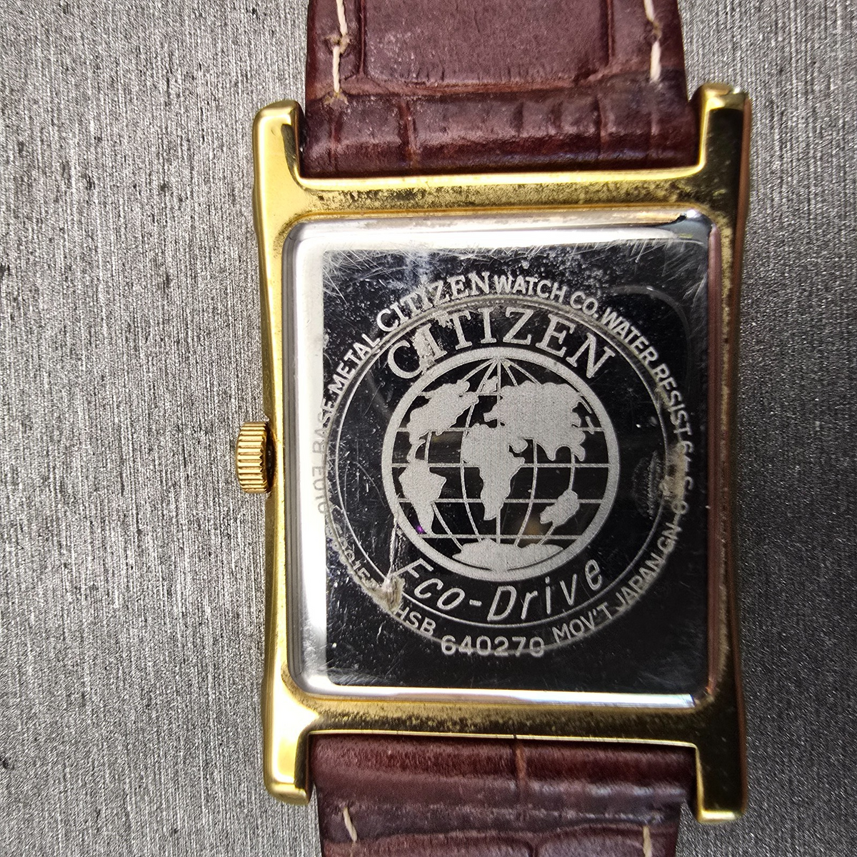 Citizen Eco-Drive Tank Watch Men 25mm Ivory Dial Gold Date E010-S001579 Works10