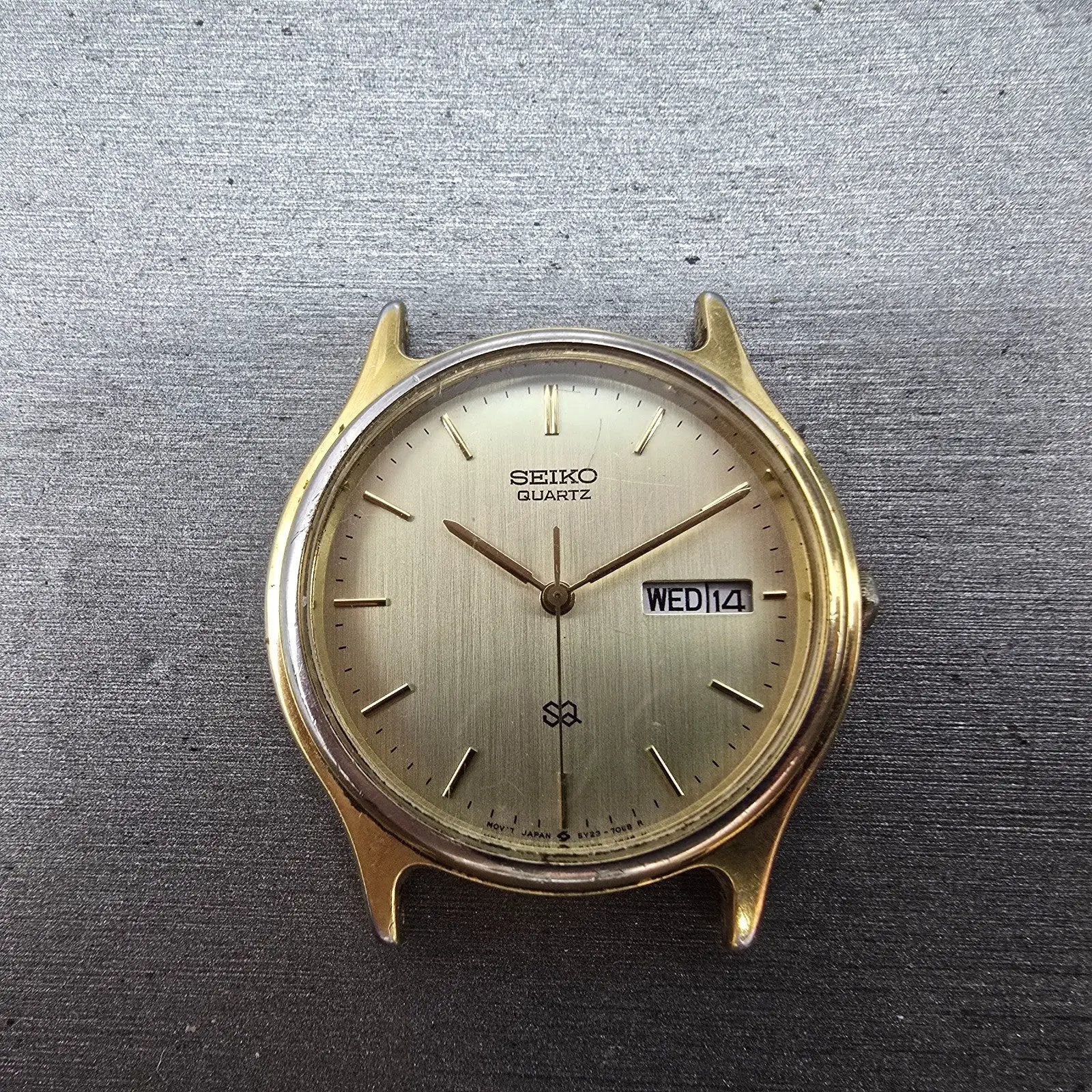 Seiko SQ Watch Men 34mm Champagne Dial Gold Tone Daydate READ!! 5y23-7030 NewBat0