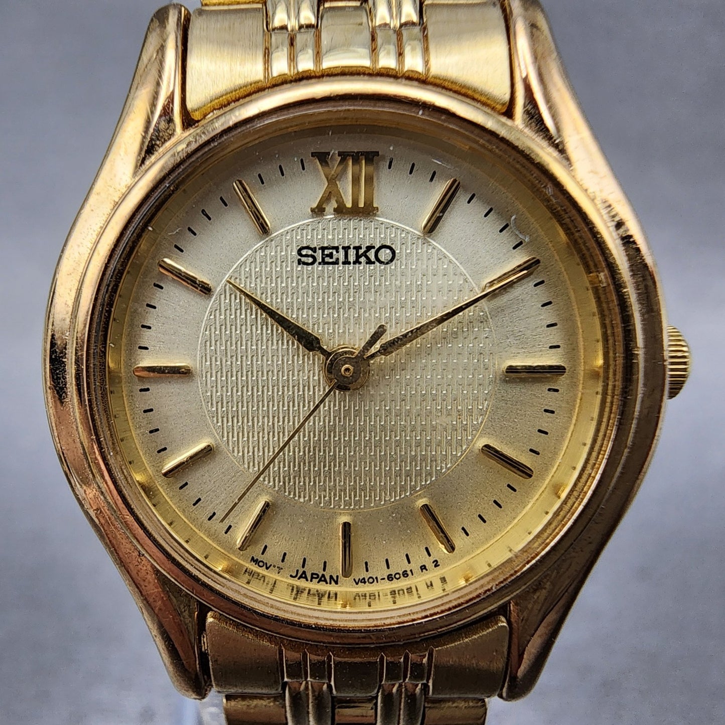 Seiko watch Women 24mm Champagne Dial Gold Tone Round V4011600 New Battery1