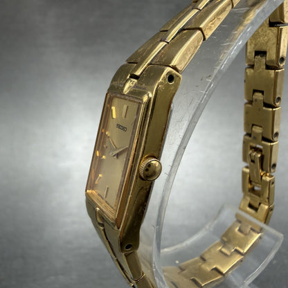 Seiko Watch Women 13mm Gold Dial Gold Tone Rectangle 2E20-7479 New Battery ABhbd2