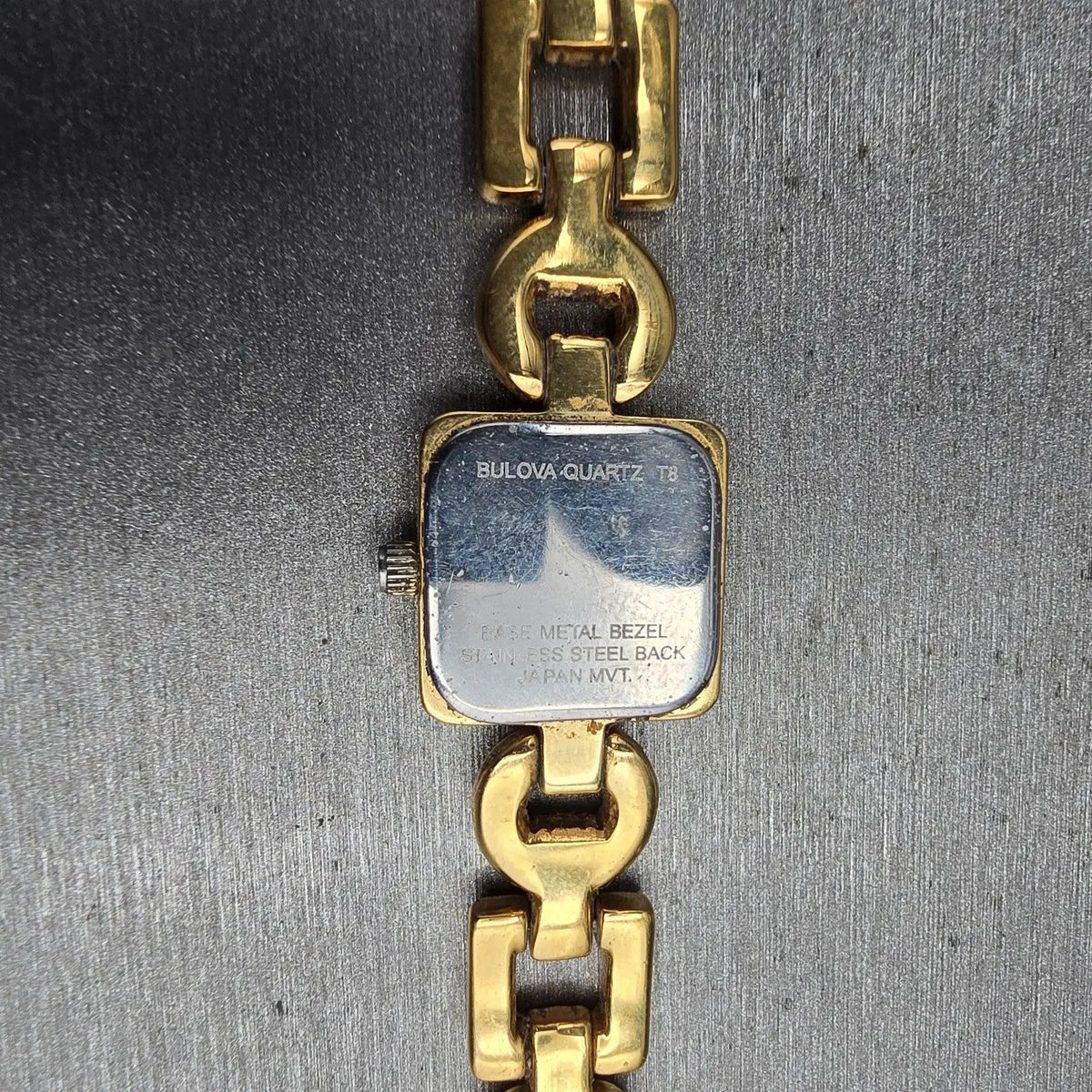 Bulova Watch Women 17mm White Dial Gold Tone Square 97T38 New Battery10