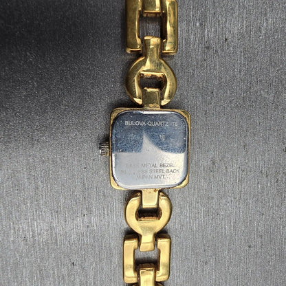 Bulova Watch Women 17mm White Dial Gold Tone Square 97T38 New Battery10