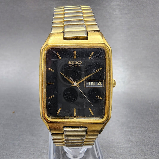 Seiko Tank Watch Men 28mm Black Dial Gold Tone Rectangle Daydate 7N335028 PARTS0