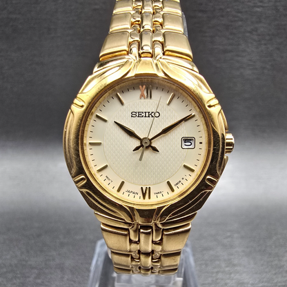 Seiko Watch Women 26mm Cream Dial Gold Tone Date Round 7N82-0AT0 New Battery JP0