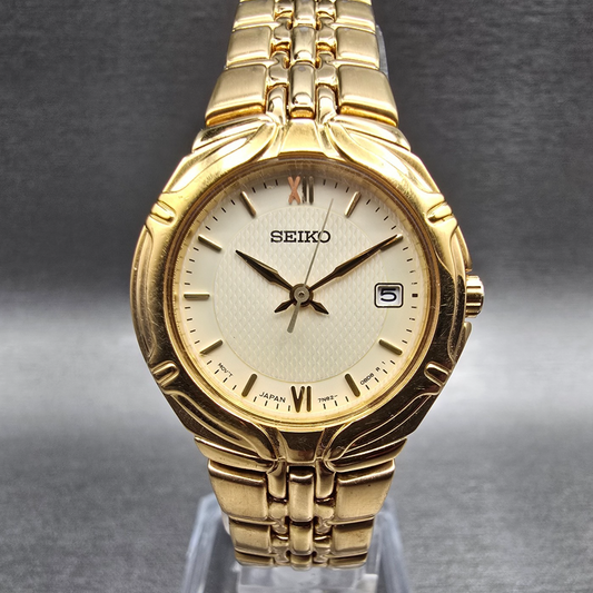 Seiko Watch Women 26mm Cream Dial Gold Tone Date Round 7N82-0AT0 New Battery JP0
