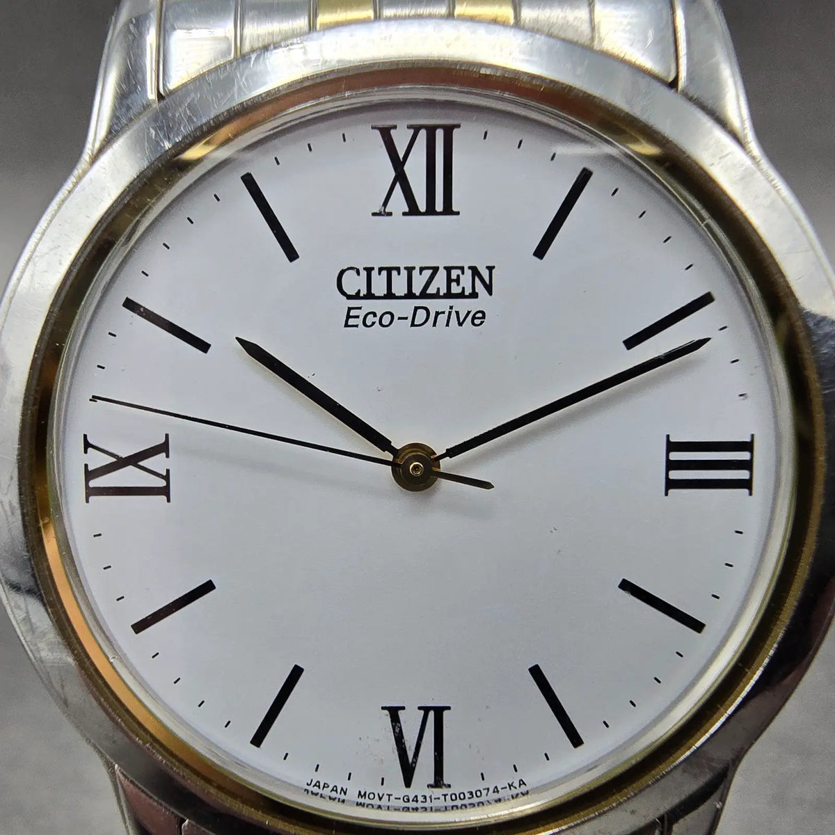 Citizen Eco-Drive Stiletto Watch Men 35mm White Dial Two Tone Round Runs JP231