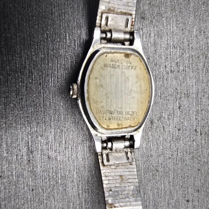 Bulova Watch Women 17mm Silver Dial Silver Tone Oval 91L09 New Battery VTG10