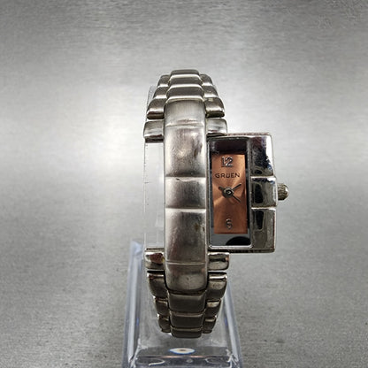 Gruen Hideaway Watch Women 16mm Pink Dial Silver Tone Rectangle GR7302 New Batt0
