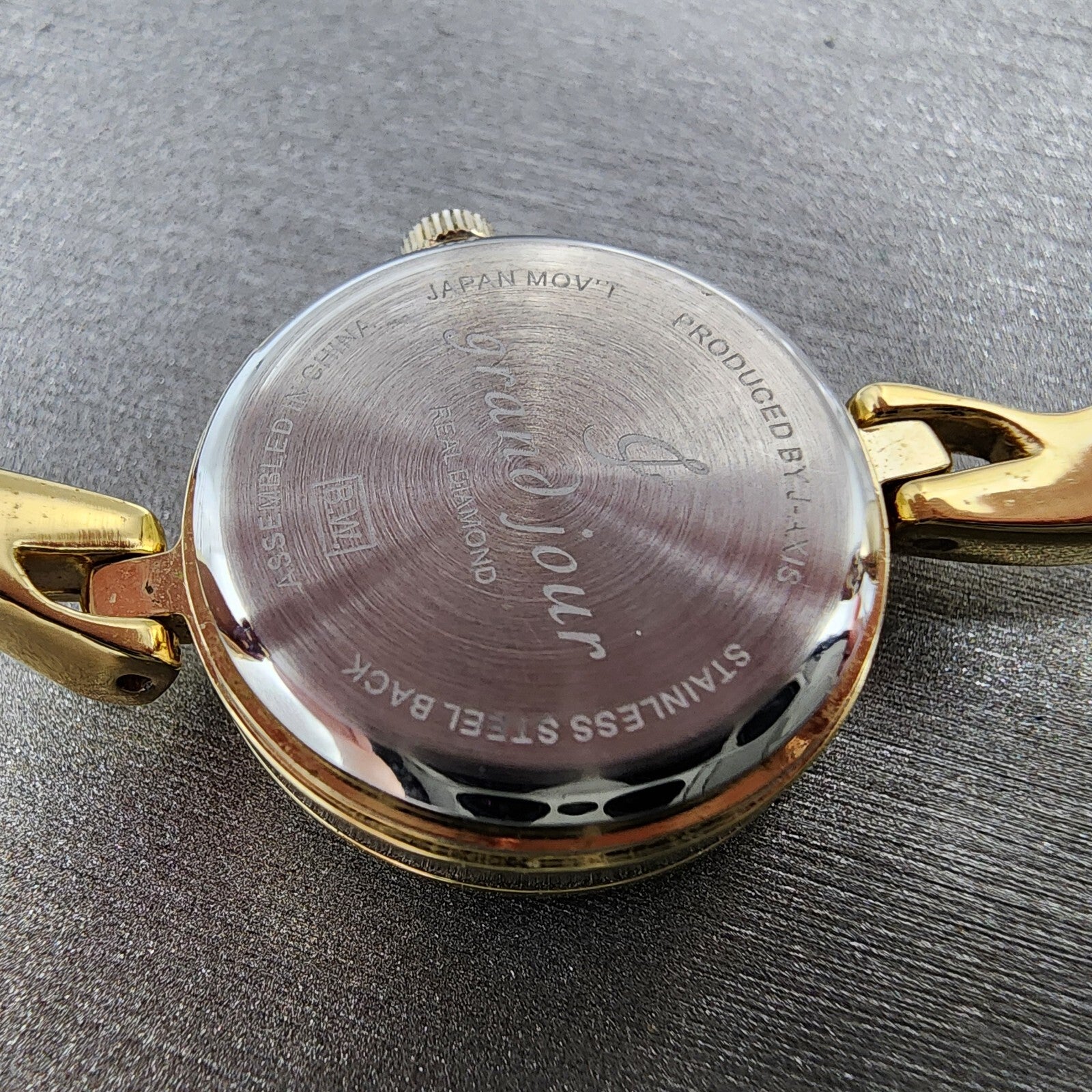 Grand Jour Interchangeable Bezel Watch Women 22mm MOP Dial Gold Tone New Battery11