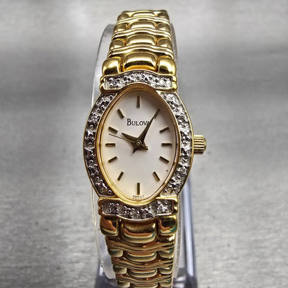 Bulova Watch Women 16mm Ivory Dial Gold Tone Gemmed Oval 98R37 New Battery0
