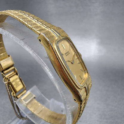 Seiko Tank Watch Women 13mm Gold Dial Gold Tone Rectangle 2E206310 New BatteryA3