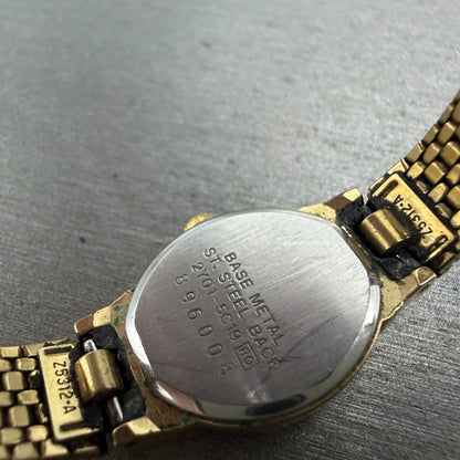 Seiko Watch Women 17mm Champagne dial Gold Tone Oval 2Y01-5C19 New Battery GVD9
