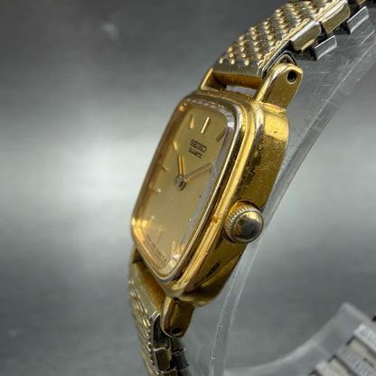 Seiko Watch Women 18mm Champagne Dial Gold Tone Rectangle 1N00-5K29 New Battery52
