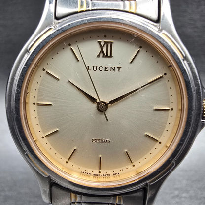 Seiko Lucent Watch Men 32mm Champagne Dial Silver Round 5E21-6B00 New Batt JDM1