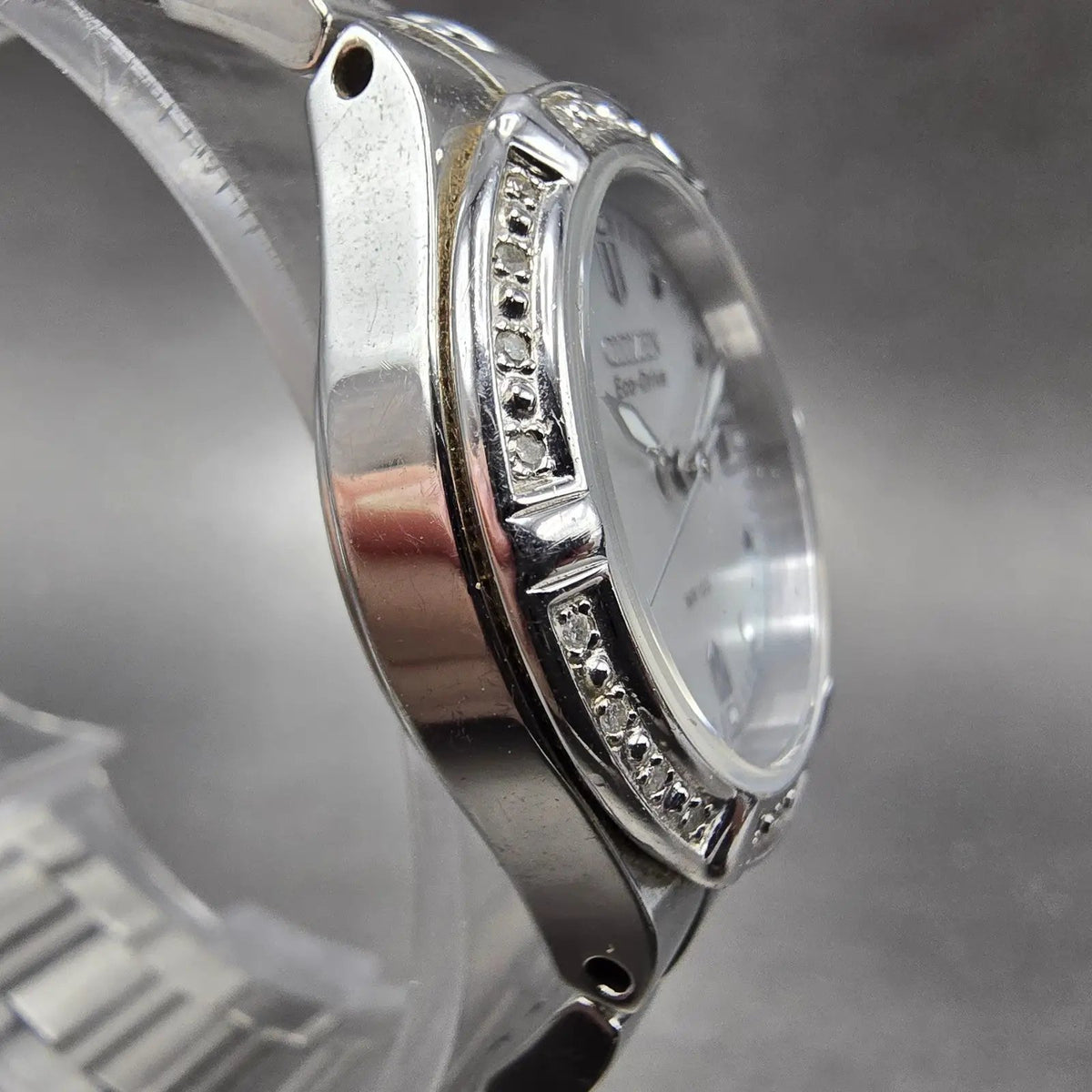 Citizen Eco-Drive Watch Women 26mm MOP Dial Silver Tone Gemmed E011-S043697 RunL3