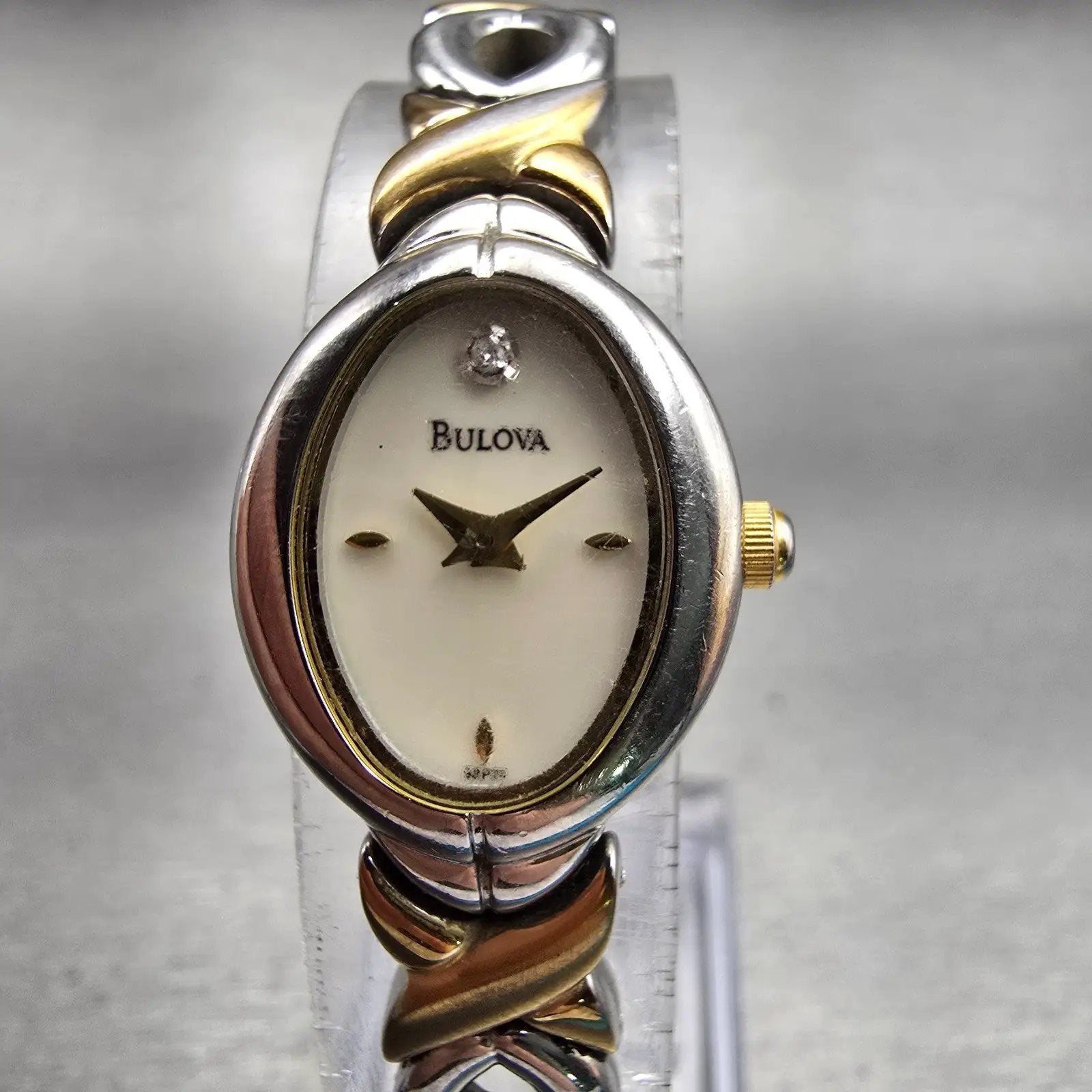 Bulova Watch Women 17mm MOP Dial Gold Tone Oval Diamond 83P24 New Battery0