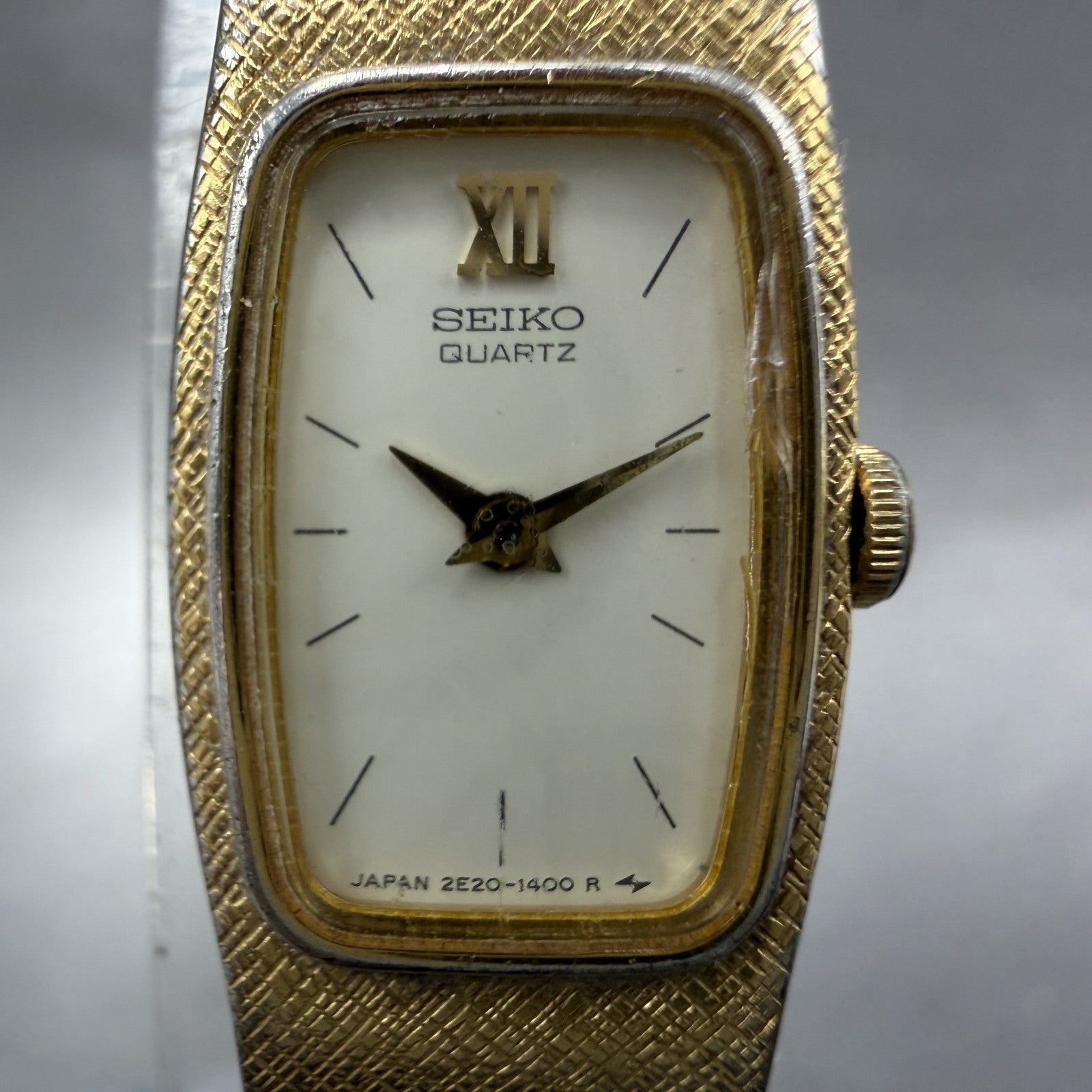 Seiko watch Women 13mm White Dial Gold Tone Rectangle 2e20-6139 New Battery1