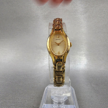 Seiko Watch Women 17mm Champagne Dial Gold Tone Oval 1N010CS0 New Battery5