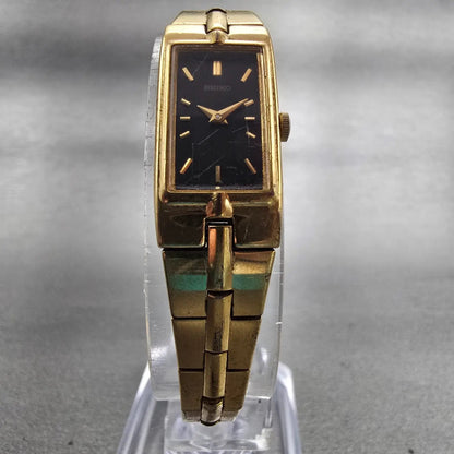 Seiko Watch Women 13mm Black Dial Gold Tone Rectangle 2E20-7479 New Battery VTG5