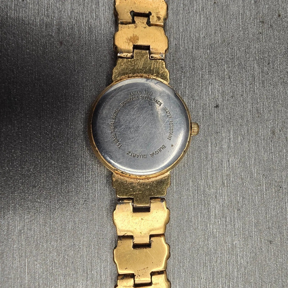 Bulova Watch Women 21mm White Dial Gold Tone Round 97L88 New Battery10