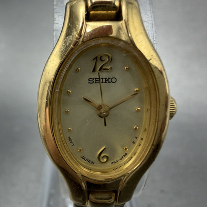 Seiko Watch Women 17mm Champagne Dial Gold Tone Oval 1N01-0CS0 New Battery1