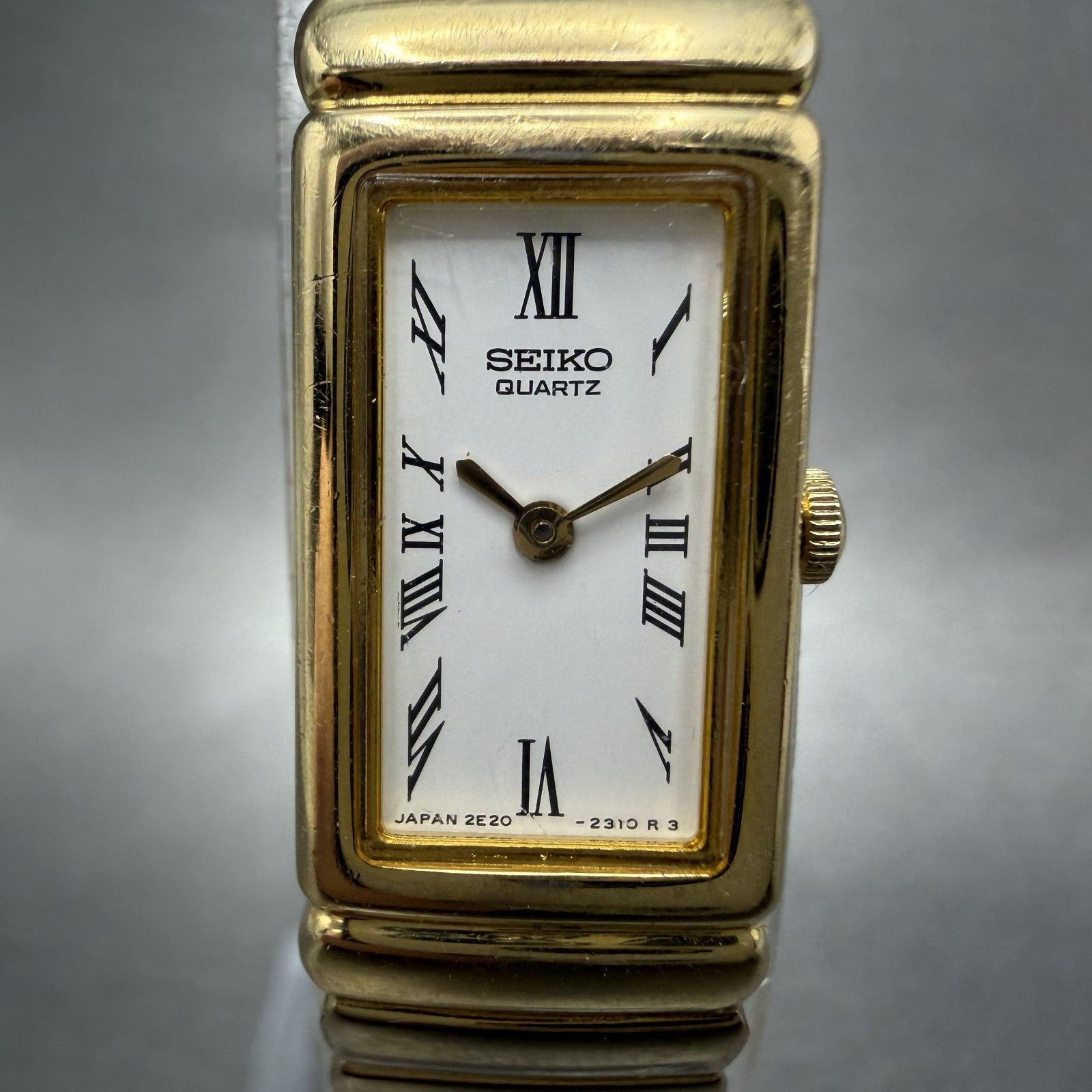 Seiko Tank Watch Women 13mm White Dial Gold Tone Rectangle 2E20-6759 New Batt YZ1
