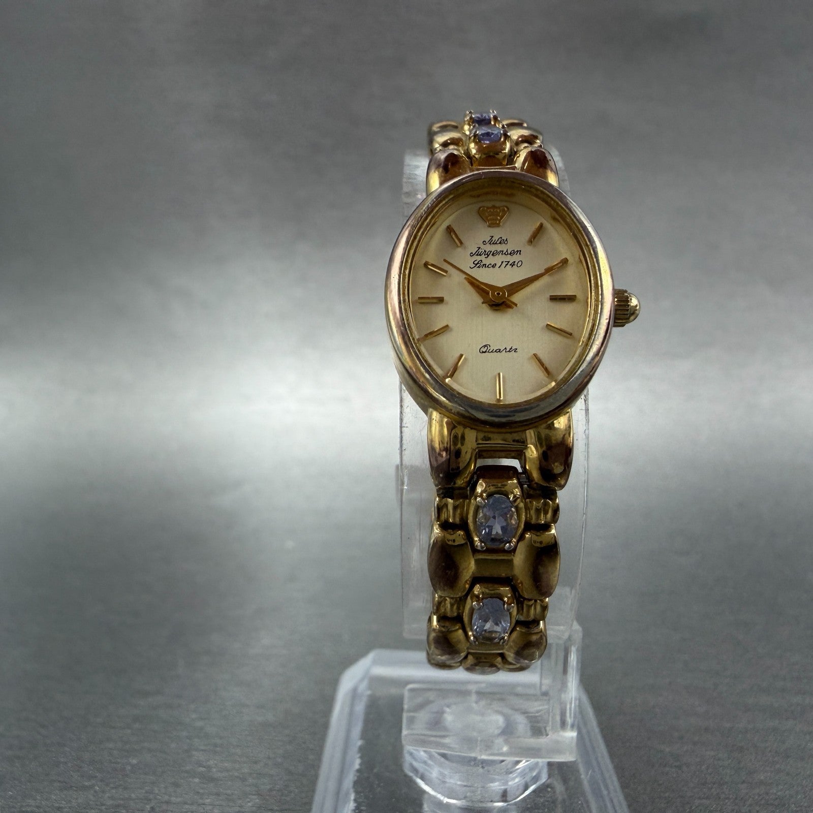 Jules Jurgenson Watch Women 17mm Champagne Dial Gold Oval Blue Gems New Battery5