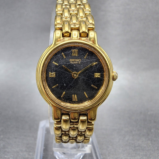 Seiko Watch Women 22mm Black Dial Gold Tone Round 1N00F030 New Battery0