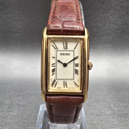 Seiko Tank Watch Women 18mm Ivory Dial Gold Tone Rectangle 1N00-0EL0 New Battery0