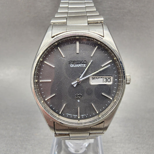Seiko SQ Watch Men 35mm Gray Dial Steel Daydate Round 75468069 PARTS0