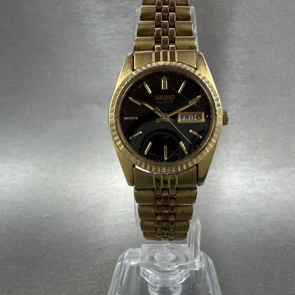 Seiko SQ Watch Women 24mm Black Dial Gold Tone Daydate 24mm Round New Battery NL5