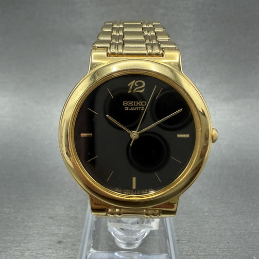 Seiko Watch Men 33mm Black Dial Gold Tone Round Vintage V7011T79 New Battery0