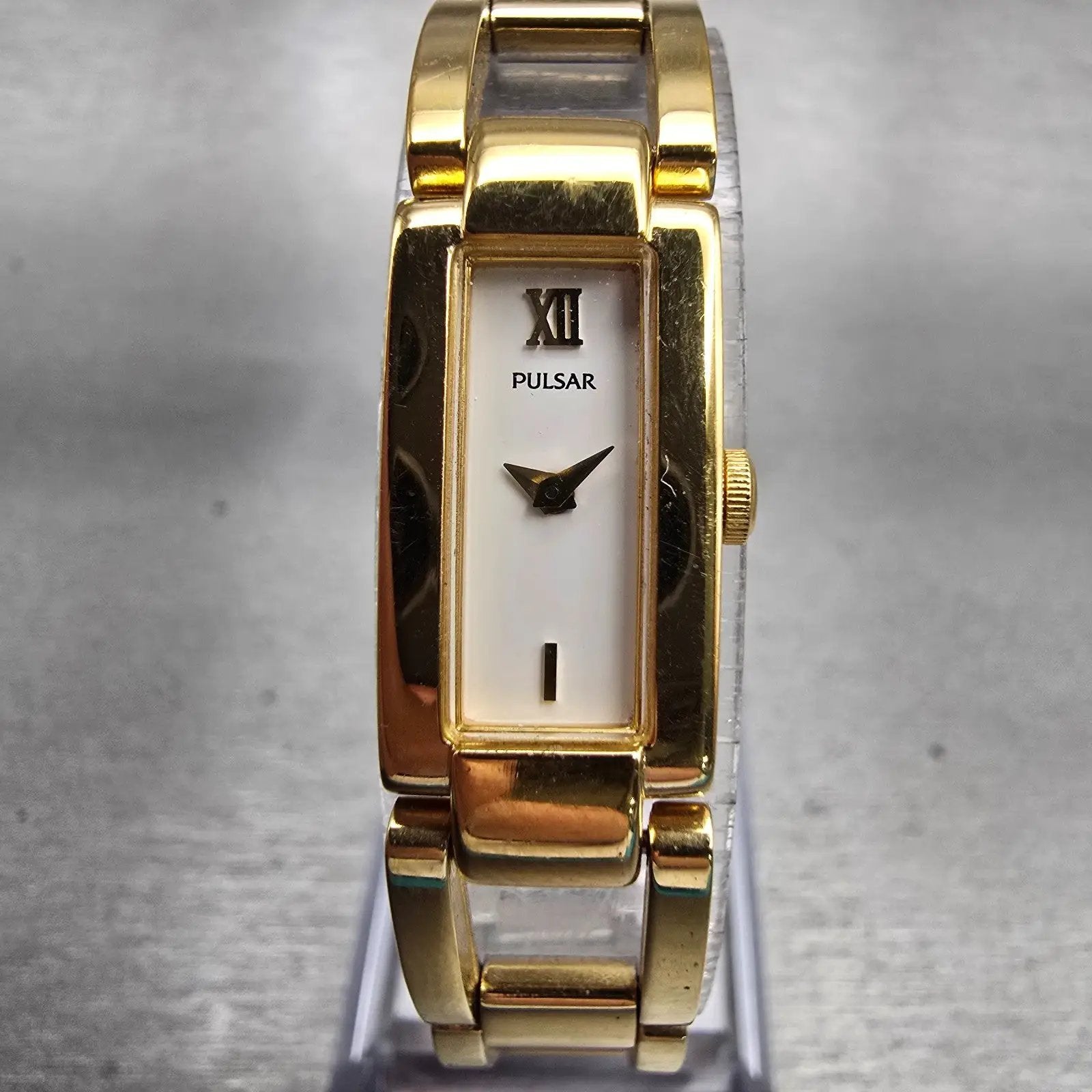 Seiko Pulsar Watch Women 12mm White Dial Gold Tone Rectangle V220-X012 New Batt0