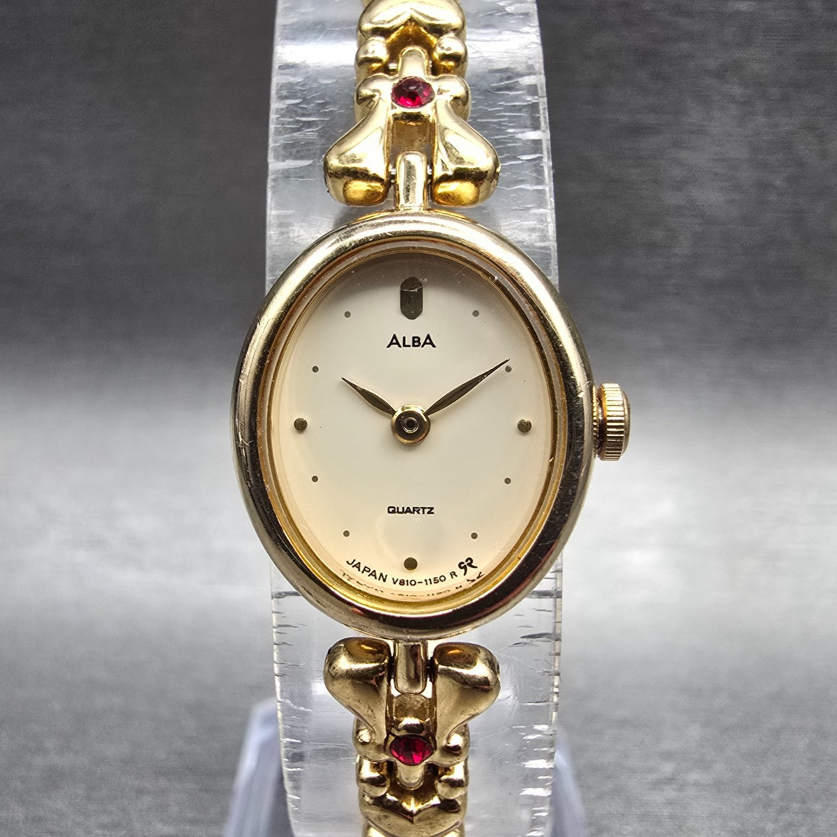 Seiko Alba Watch Women 17mm Cream Dial Gold Gems Oval V810-5020 New Battery0