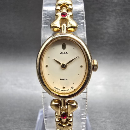 Seiko Alba Watch Women 17mm Cream Dial Gold Gems Oval V810-5020 New Battery0