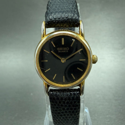 Seiko Watch Women 20mm Black Dial Gold Tone Round Vintage 1N00-0F69 New BatteryJ0