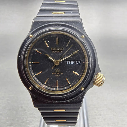 Seiko SQ Sports 100 Watch Women 26mm Black Dial Black & Gold Tone Daydate NewBat0