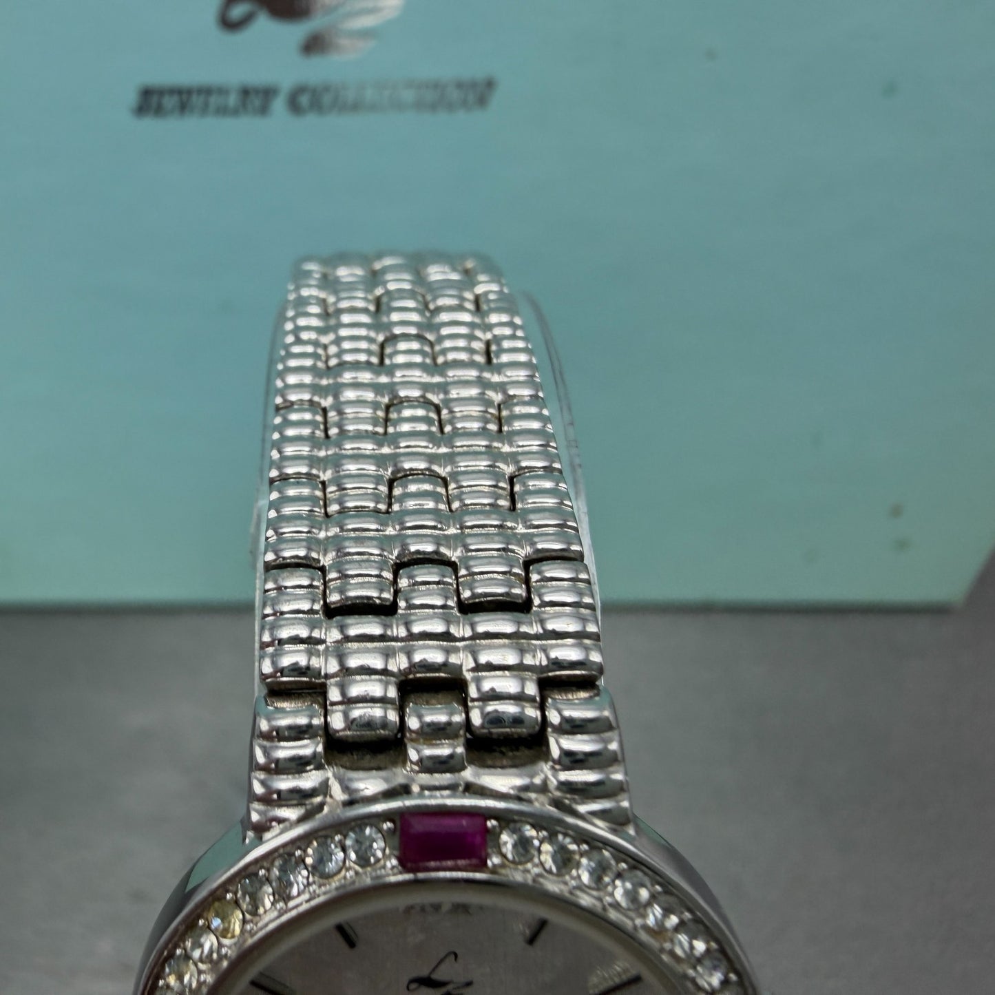 LZ Watch Women 25mm White Dial Silver Tone Ruby Bezel Round New Battery4