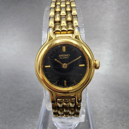 Seiko Watch Women 19mm Black Dial Gold Tone Round 1N00-0C49 New Battery
