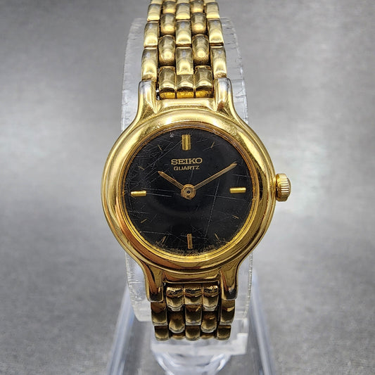 Seiko Watch Women 19mm Black Dial Gold Tone Round 1N00-0C49 New Battery