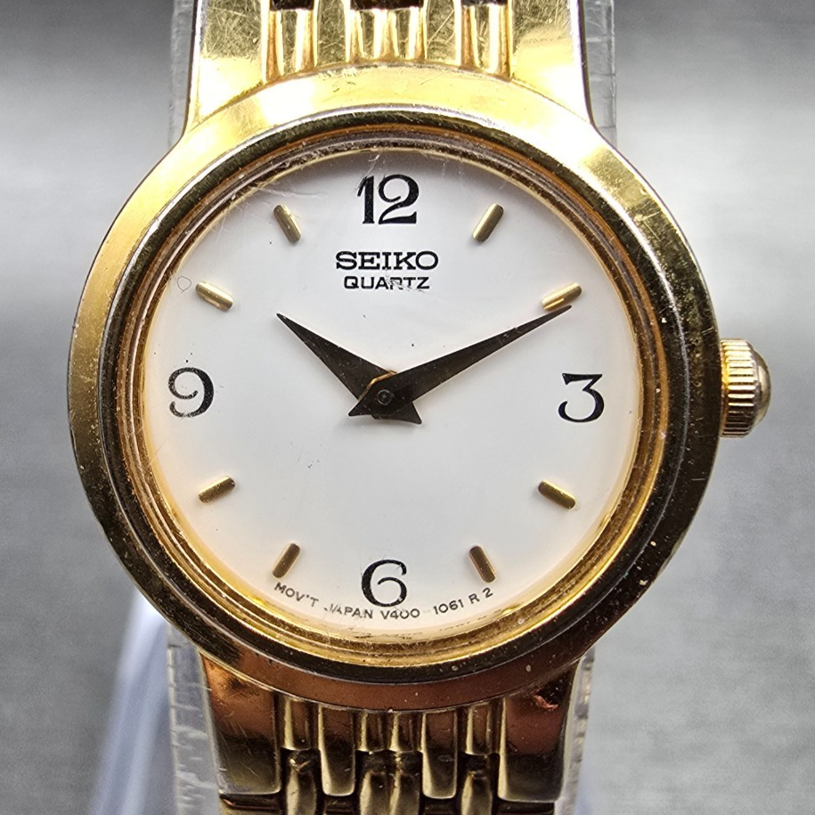Seiko Watch Women 19mm White Dial Gold Tone Round V400-0368 New Battery1