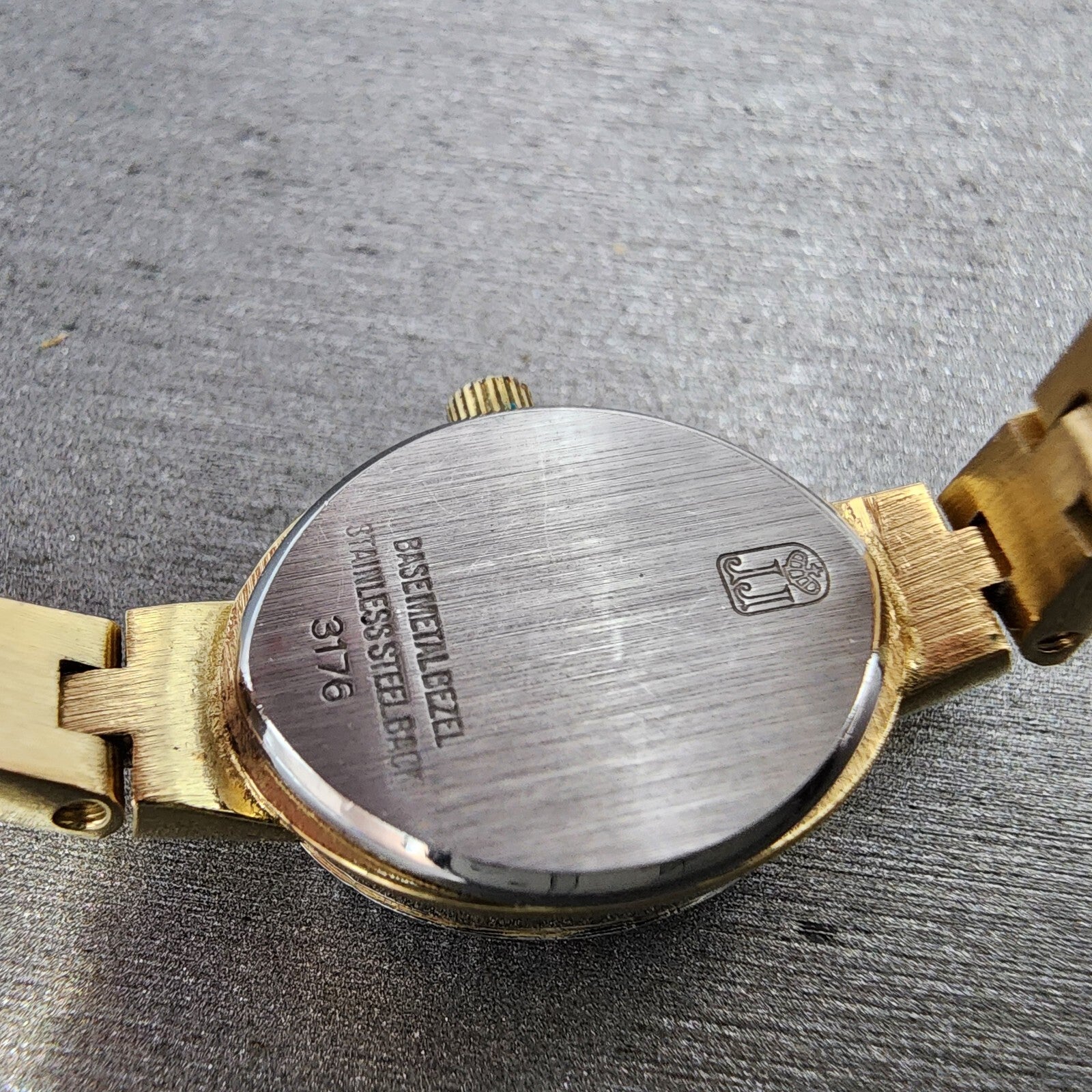 Jules Jurgenson Watch Women 15mm Gold Dial Gold Tone Oval Gem Set Bezel Runs9