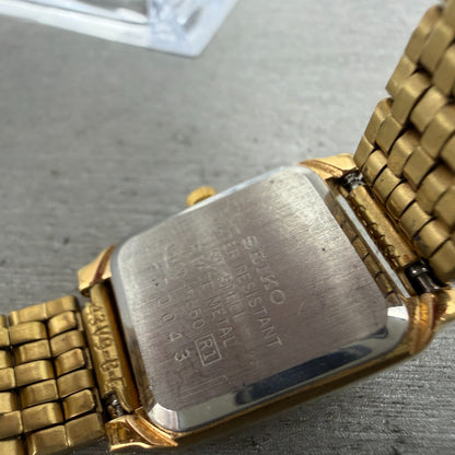 Seiko Tank Watch Women 18mm Black Dial Gold Tone Rectangle V401-5650 New Batt JO9