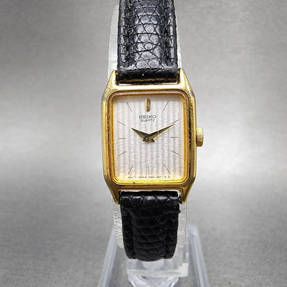 Seiko Tank Watch Women 17mm Silver Dial Gold Tone Rectangle 4N005121 New Batt0